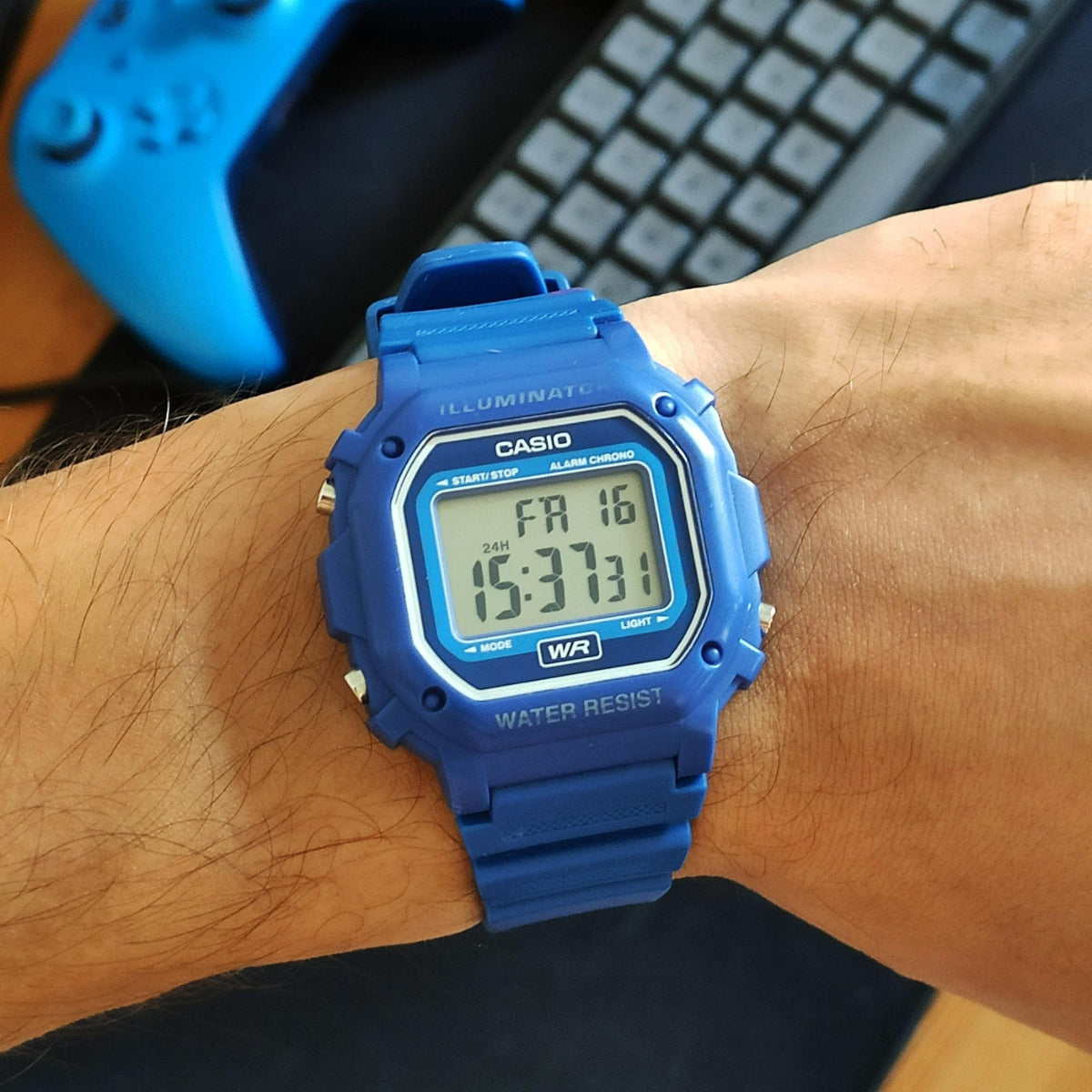 Casio Classic F-108WH-2AEF blue square dial digital watch on wrist