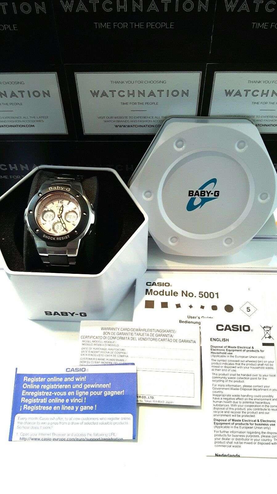 Baby-G women's wristwatch in display box with documentation cards