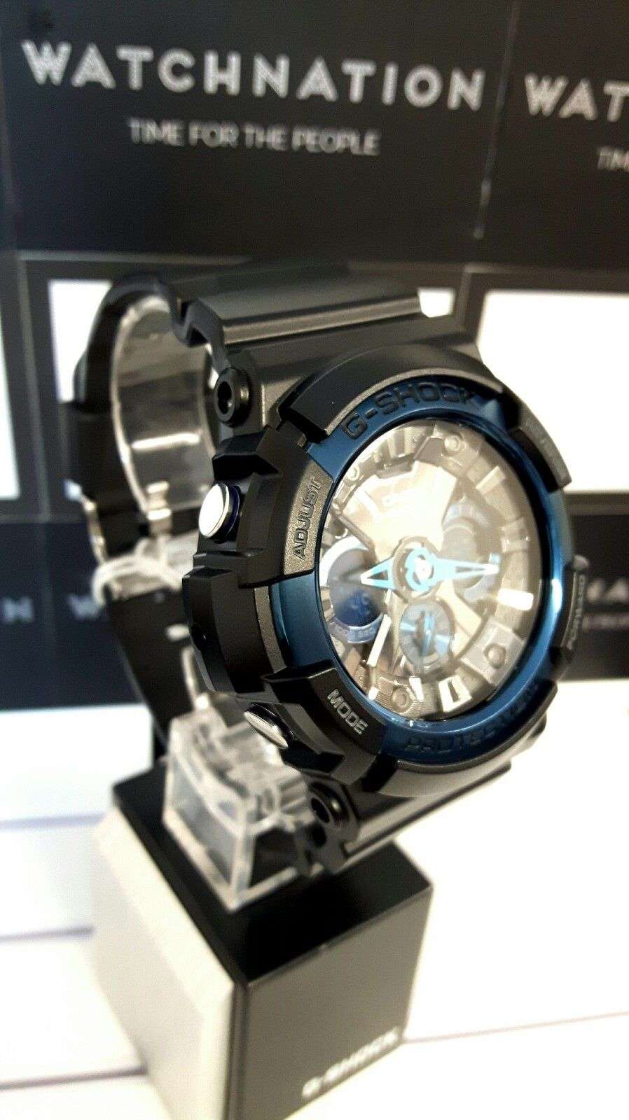 Casio G-Shock men’s watch side view with blue bezel and skeleton-style dial