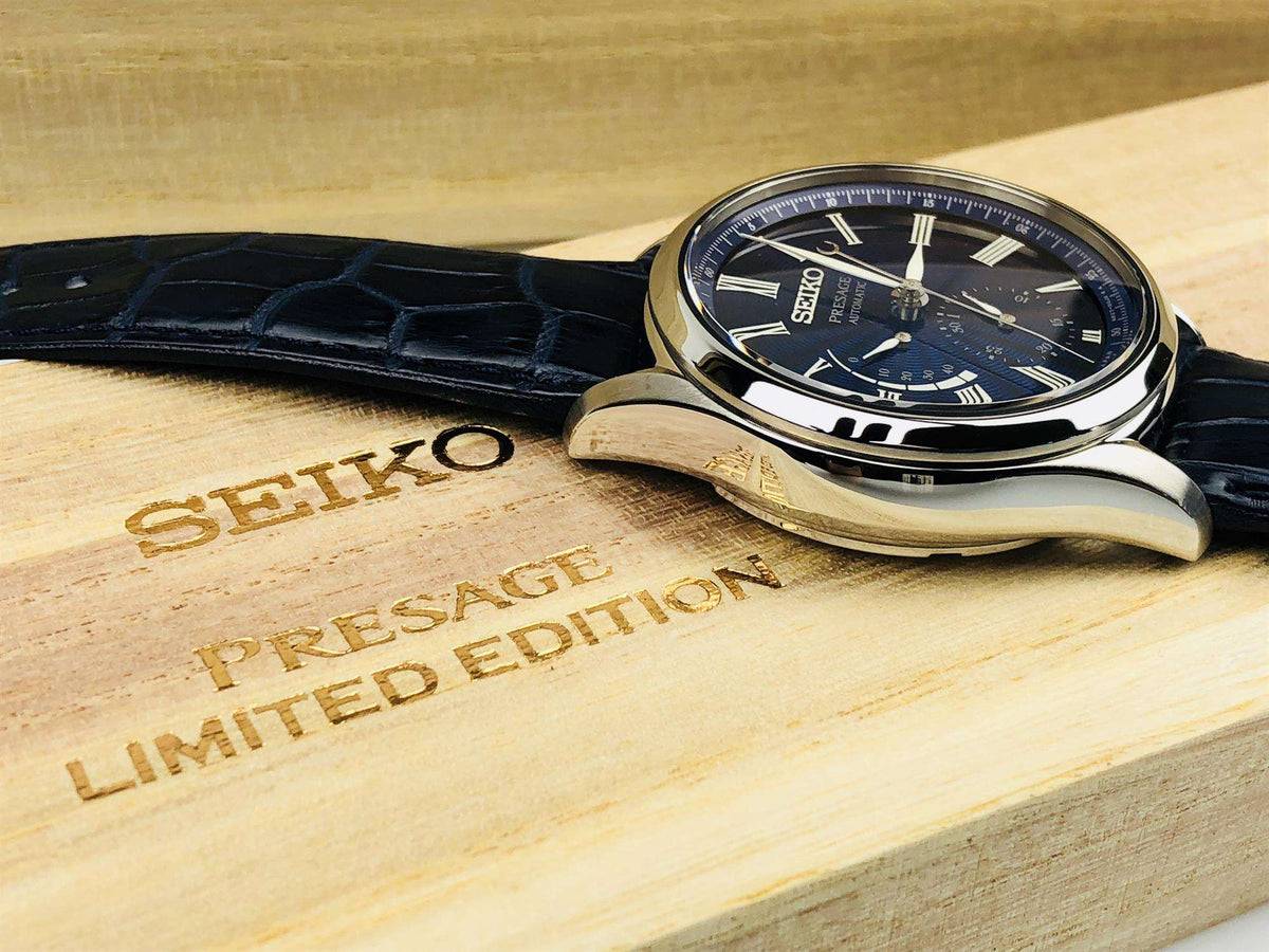 Seiko Presage automatic watch, blue dial and stainless case with blue leather strap, angled