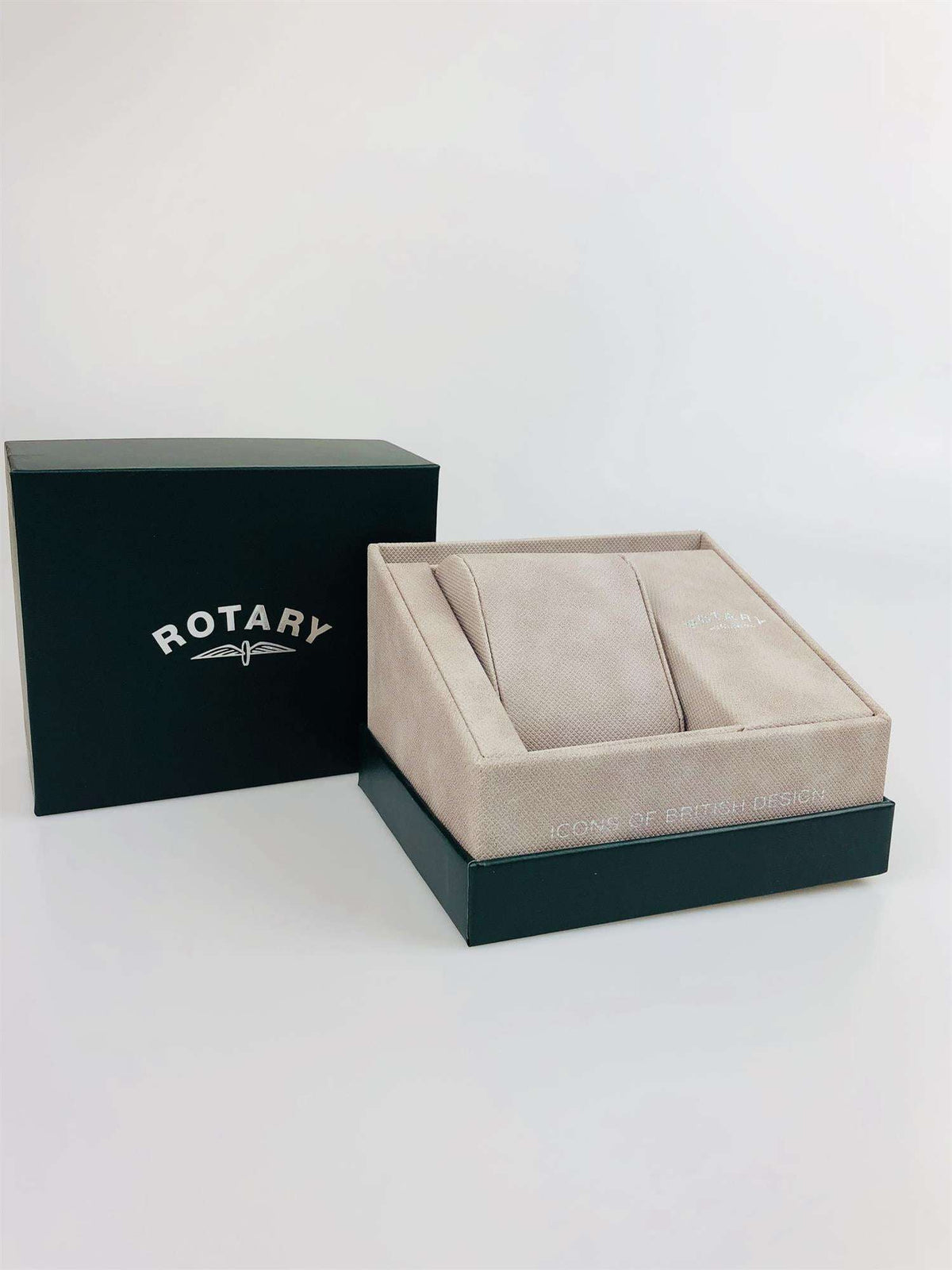 Watch gift set: dark box with open beige cushion tray for the watch