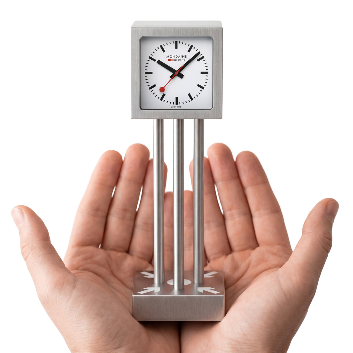 Miniature table clock with brushed aluminum base and white face