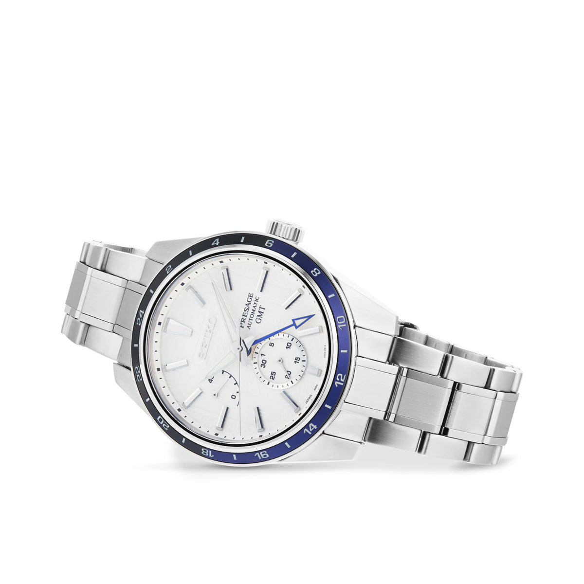Seiko GMT wristwatch, white dial with subdials, blue bezel ring, stainless steel bracelet