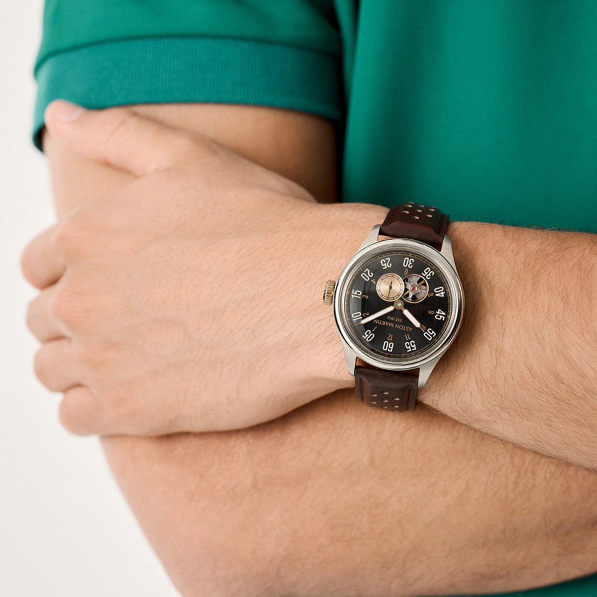Aston Martin automatic open-heart watch with black dial and brown perforated leather strap