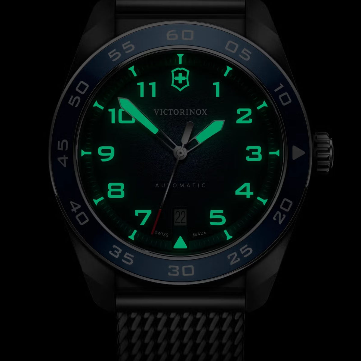 Men's Victorinox Swiss Army automatic watch with blue dial and green luminous numerals