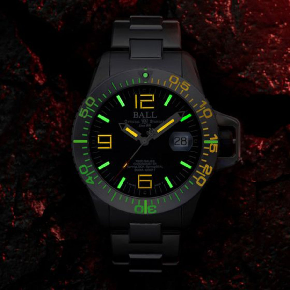 BALL Engineer Hydrocarbon EOD DM3200A-S1C-BK front view highlighting illuminated dial markers against dark background