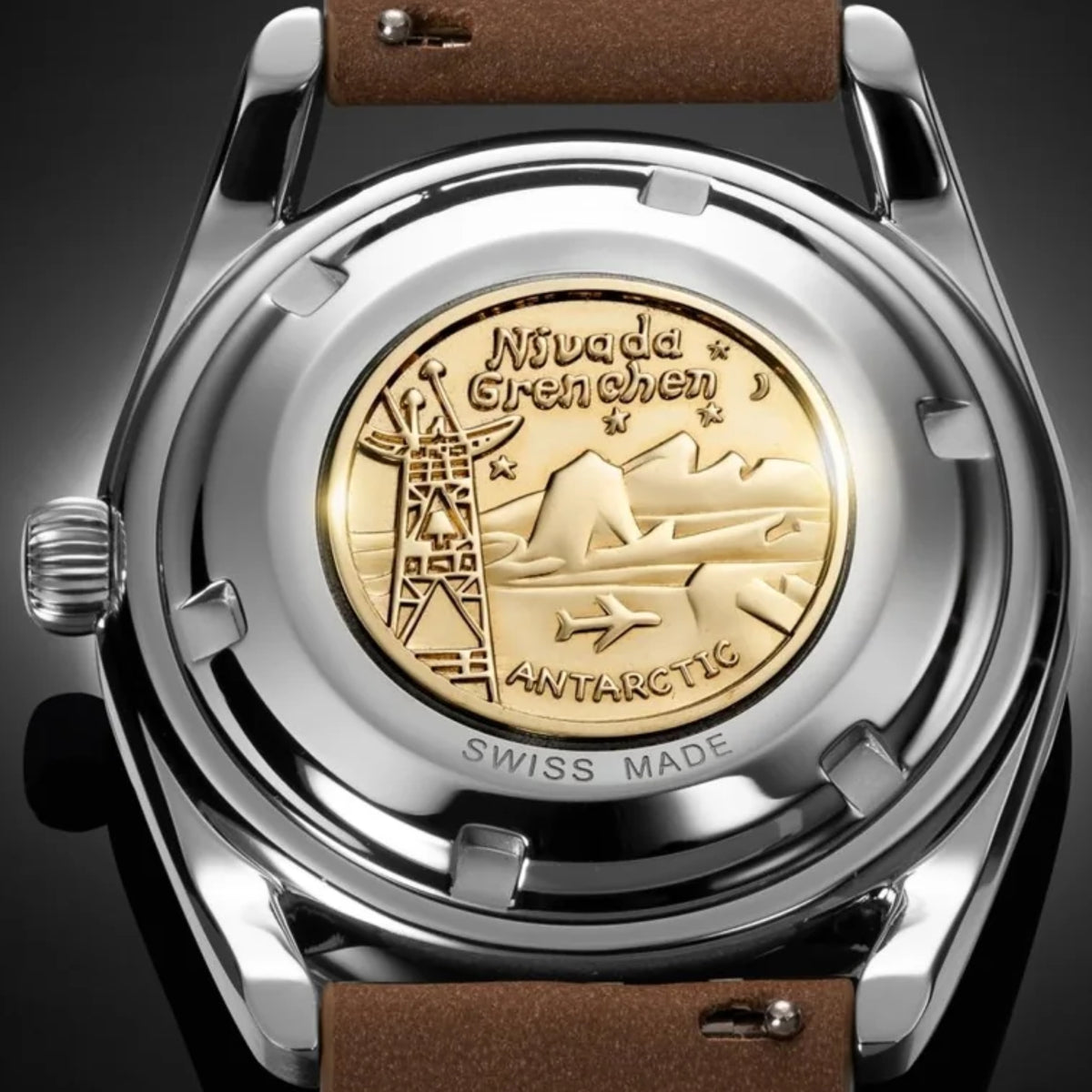 Men's automatic wristwatch back with gold-toned Antarctic medallion and brown strap