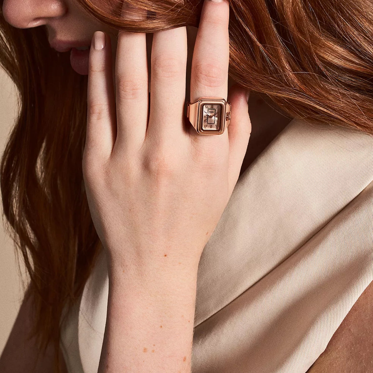 Fossil Raquel ES5345 lifestyle view of model wearing ladies quartz ring watch on the index finger