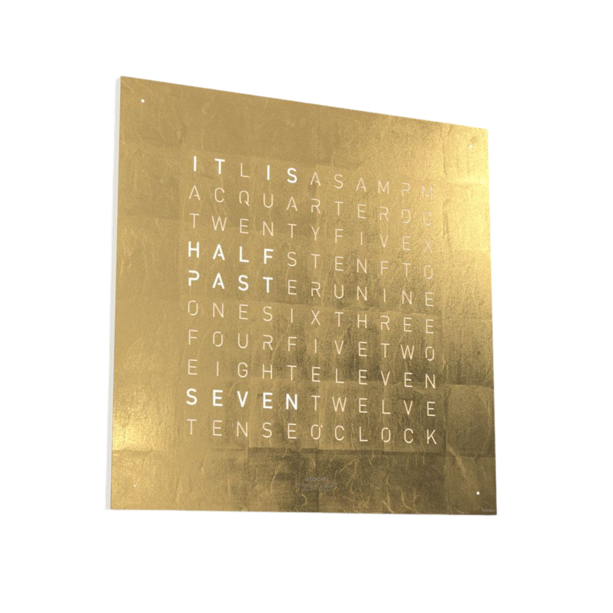 Gold English wall clock face angled view with illuminated letter grid