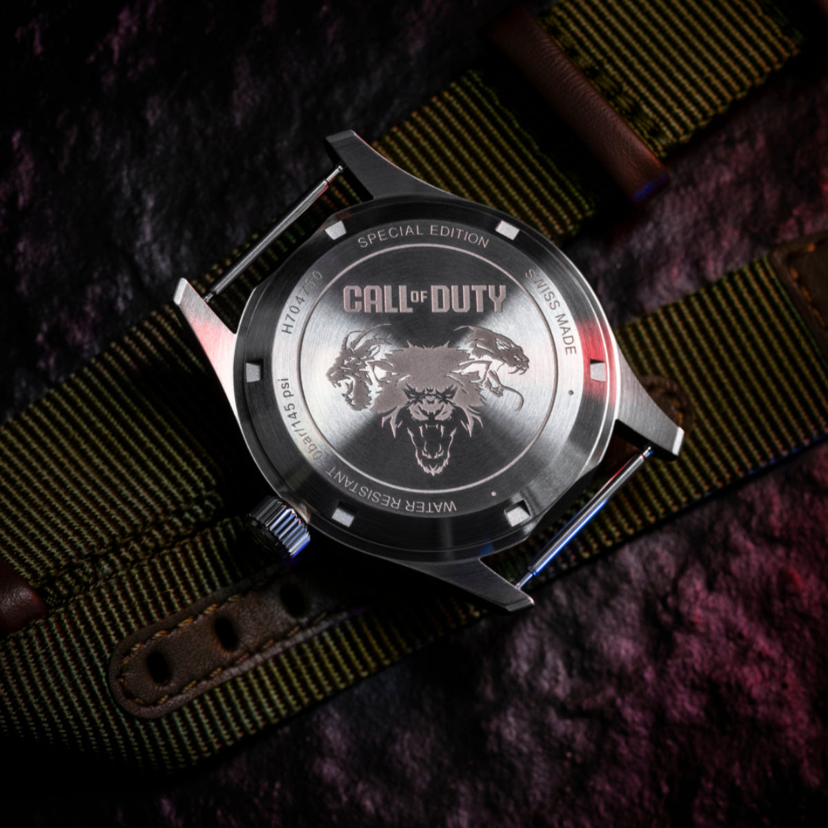 Special edition watch with silver case and black dial, olive-green NATO strap