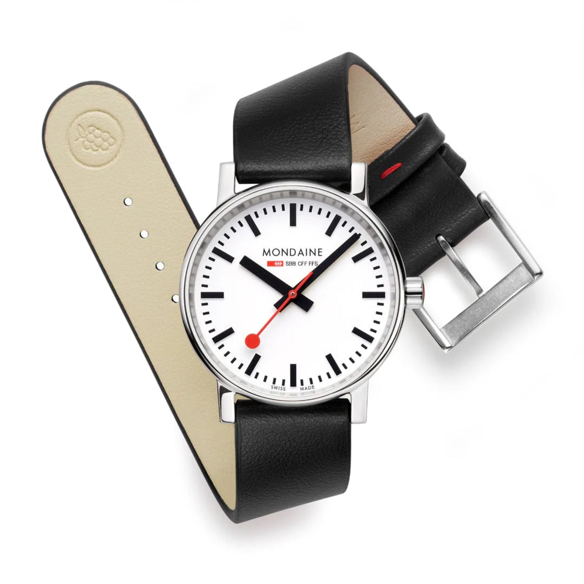 Mondaine Evo2 MSE.35110.LBV minimalist watch resting curled, showing light beige inner strap lining and silver buckle