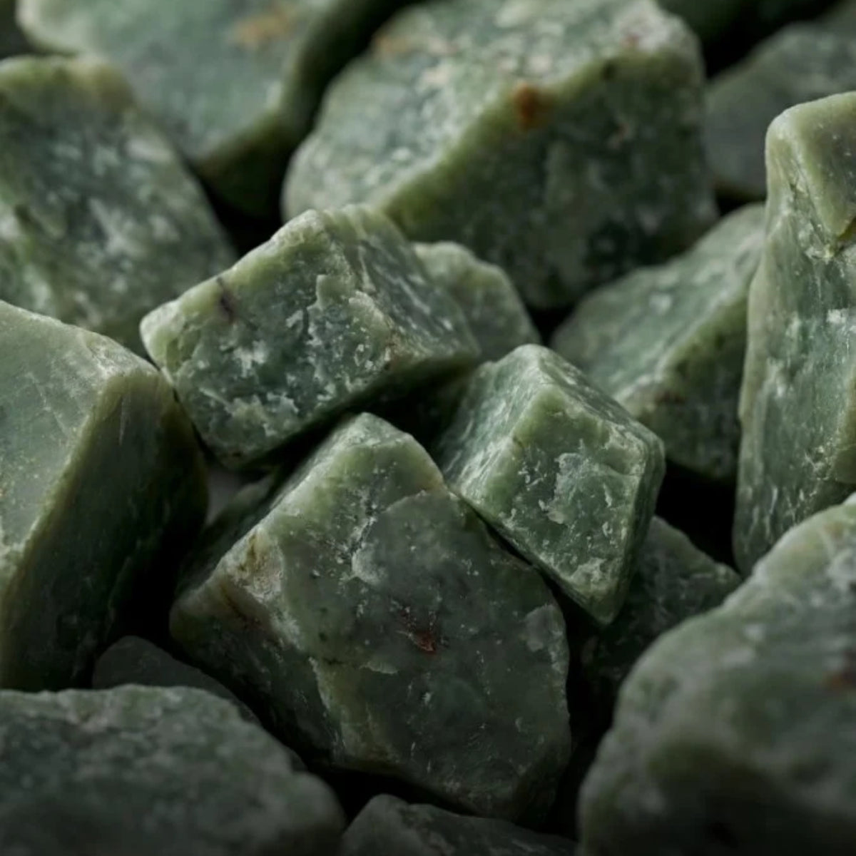 Nivada Grenchen F77 68055A77 macro view of raw jade mineral stone