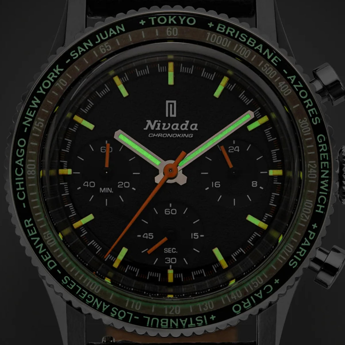 Men's black chronograph quartz watch with green markers and orange GMT hands