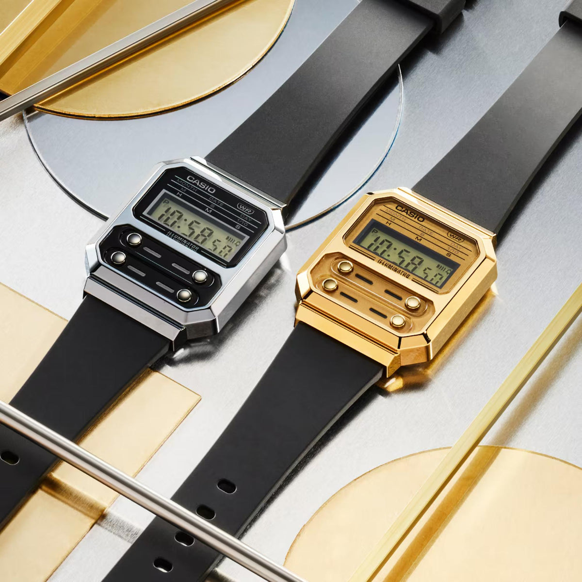 Gold-tone digital watch on dark silicone strap with visible side buttons and LCD