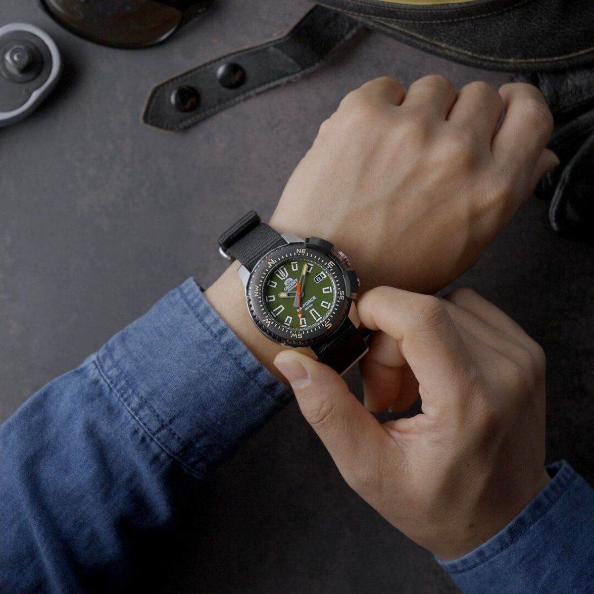 Orient M-Force men's automatic wristwatch with 45mm green dial and black NATO strap