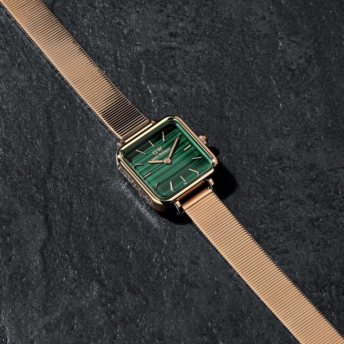 Daniel Wellington Quadro watch angled view, green dial with rose-gold tone steel strap