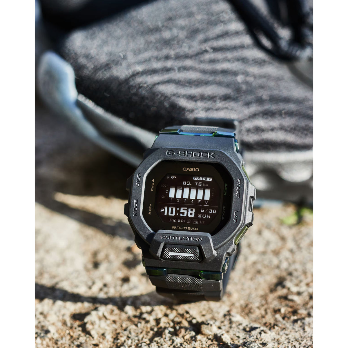 Casio G-Shock digital watch with dark resin strap and rugged octagonal face display