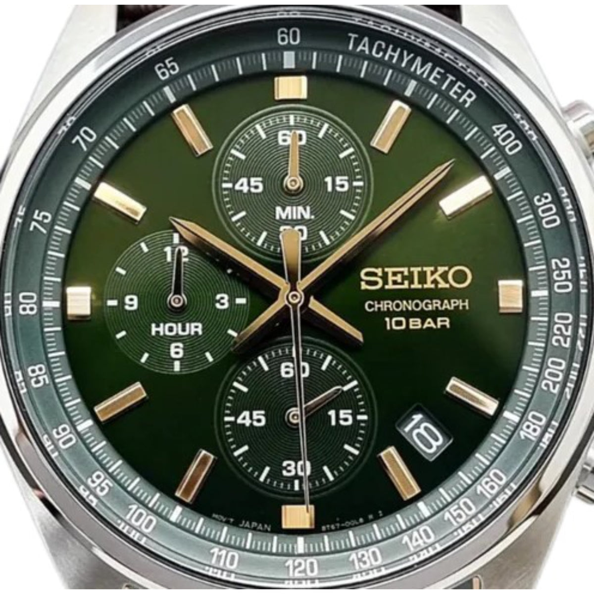 Close-up of Seiko SSB385P1 green sunburst chronograph dial with sub-dials