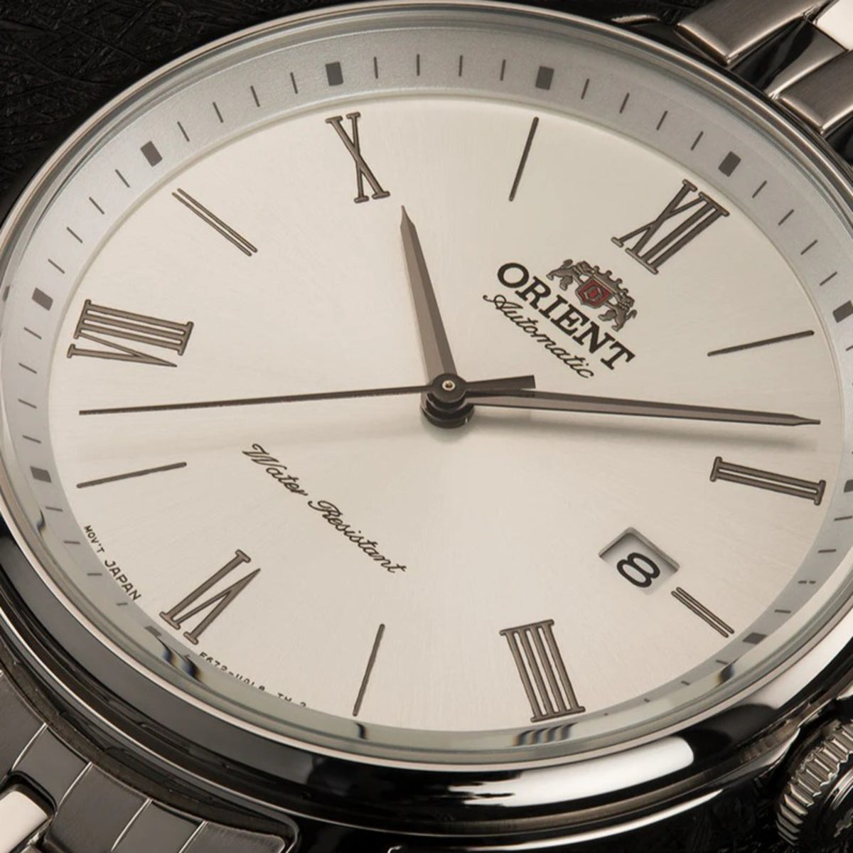 Silver dial men's automatic watch with Roman numerals and Orient logo
