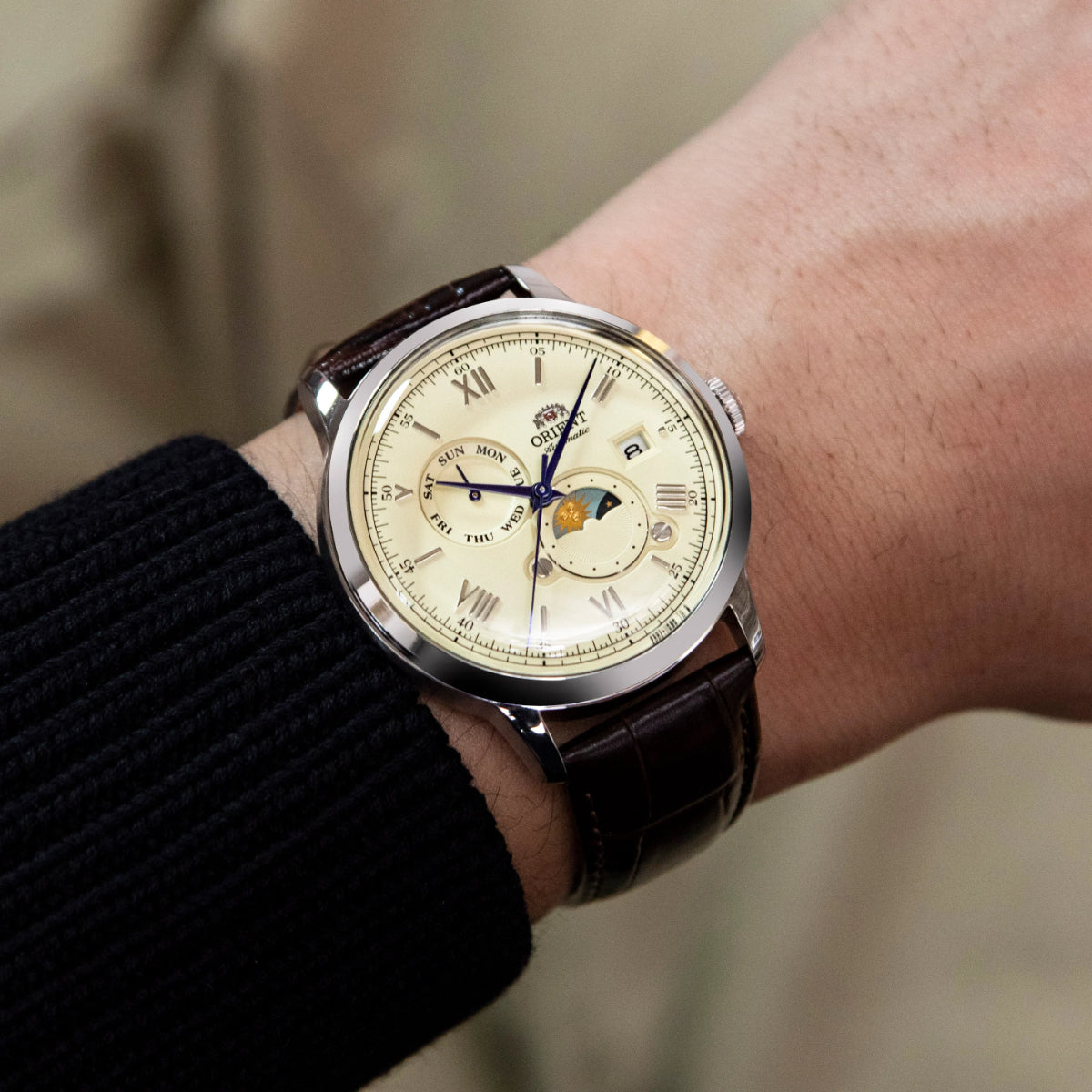 Orient Automatic Sun and Moon RA‑AK0803Y30B cream dial on wrist view