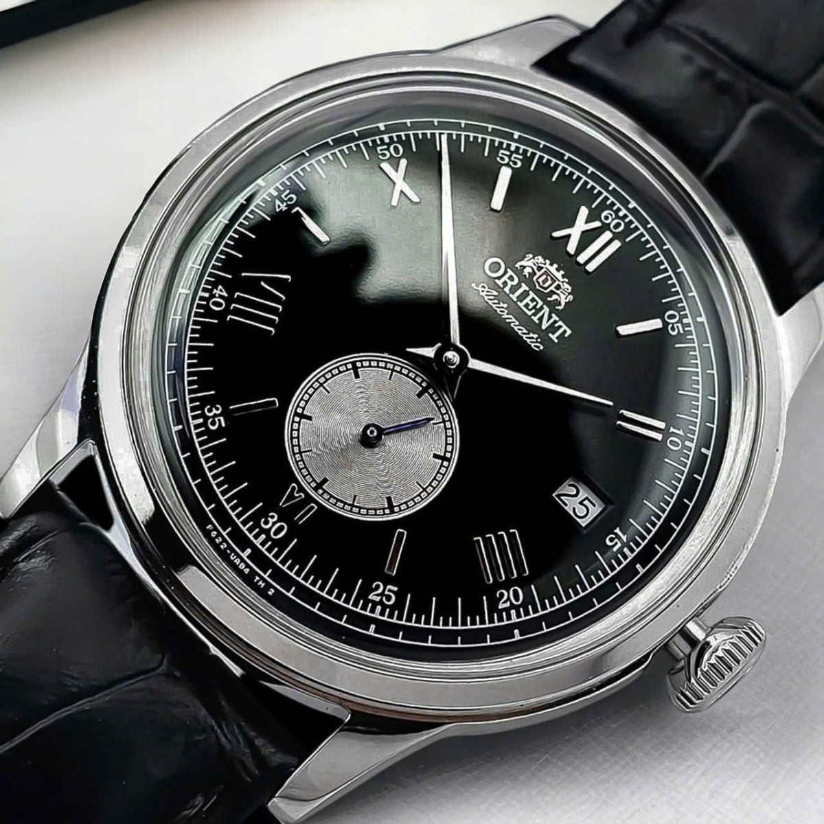 Orient Bambino Version 2 automatic watch, black dial with baton markers, sub-seconds dial, leather strap