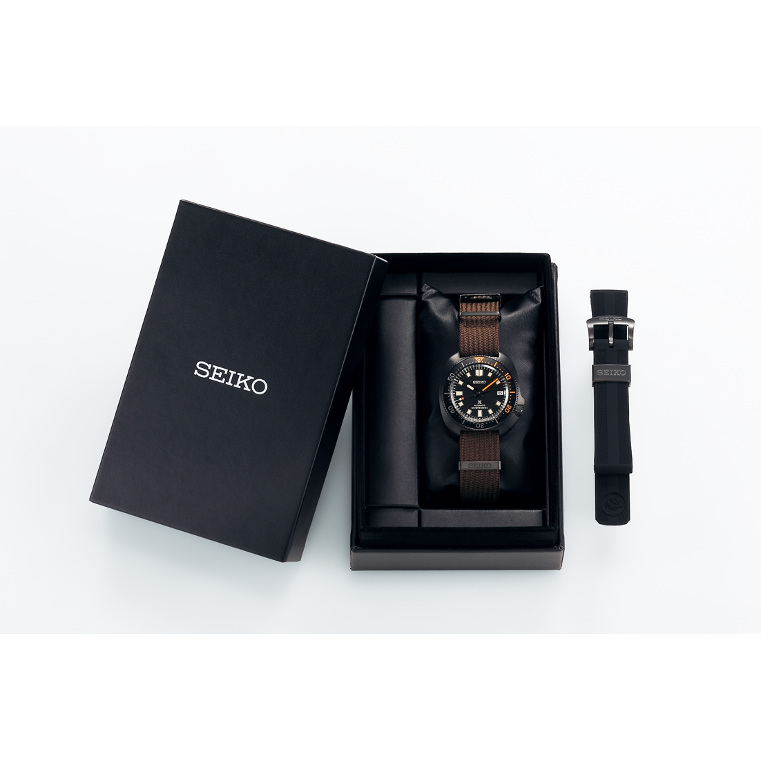 Seiko watch in gift box with brown textile strap and spare black strap