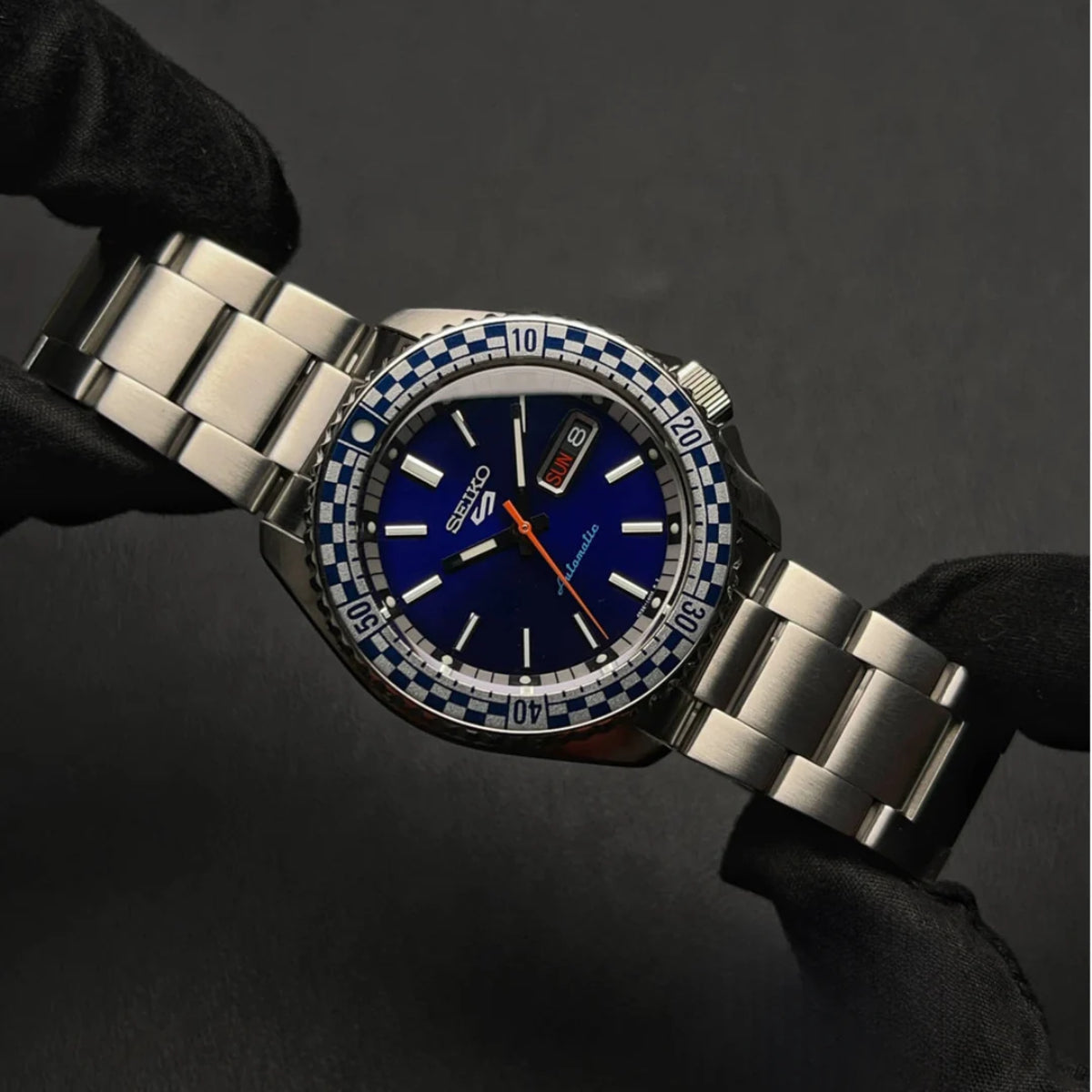 Seiko 5 Sports SRPK65K1 stainless steel case and full bracelet view