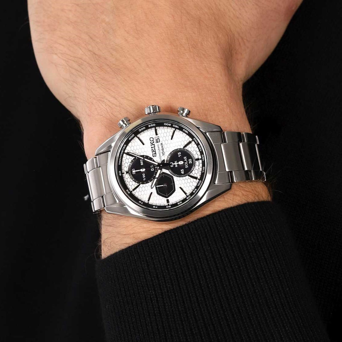 Seiko Essentials SSC769P1 solar chronograph watch on a mans wrist lifestyle view