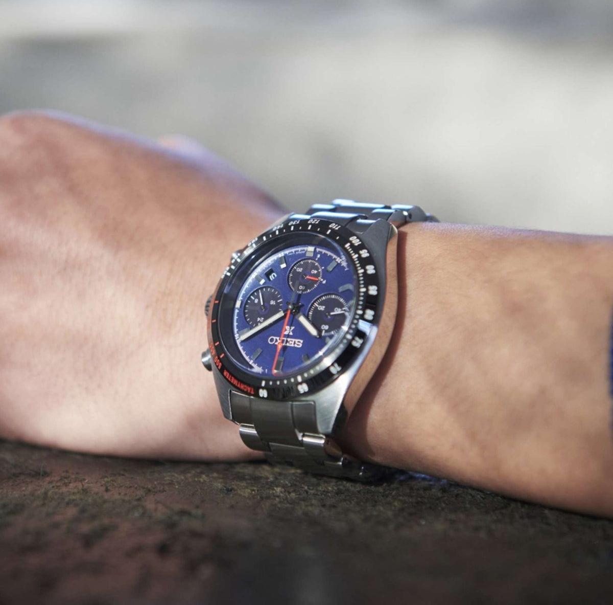 Seiko Prospex Speedtimer chronograph watch on wrist with black strap and blue dial