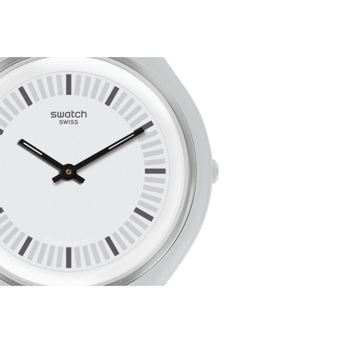 Close-up of grey Swatch watch dial with black hands and markers under glass.
