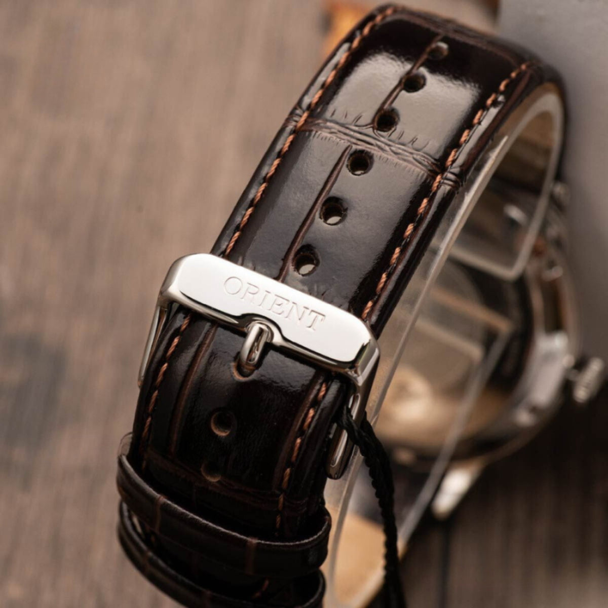 Orient Bambino II watch TAC00009N0 showing its brown leather strap