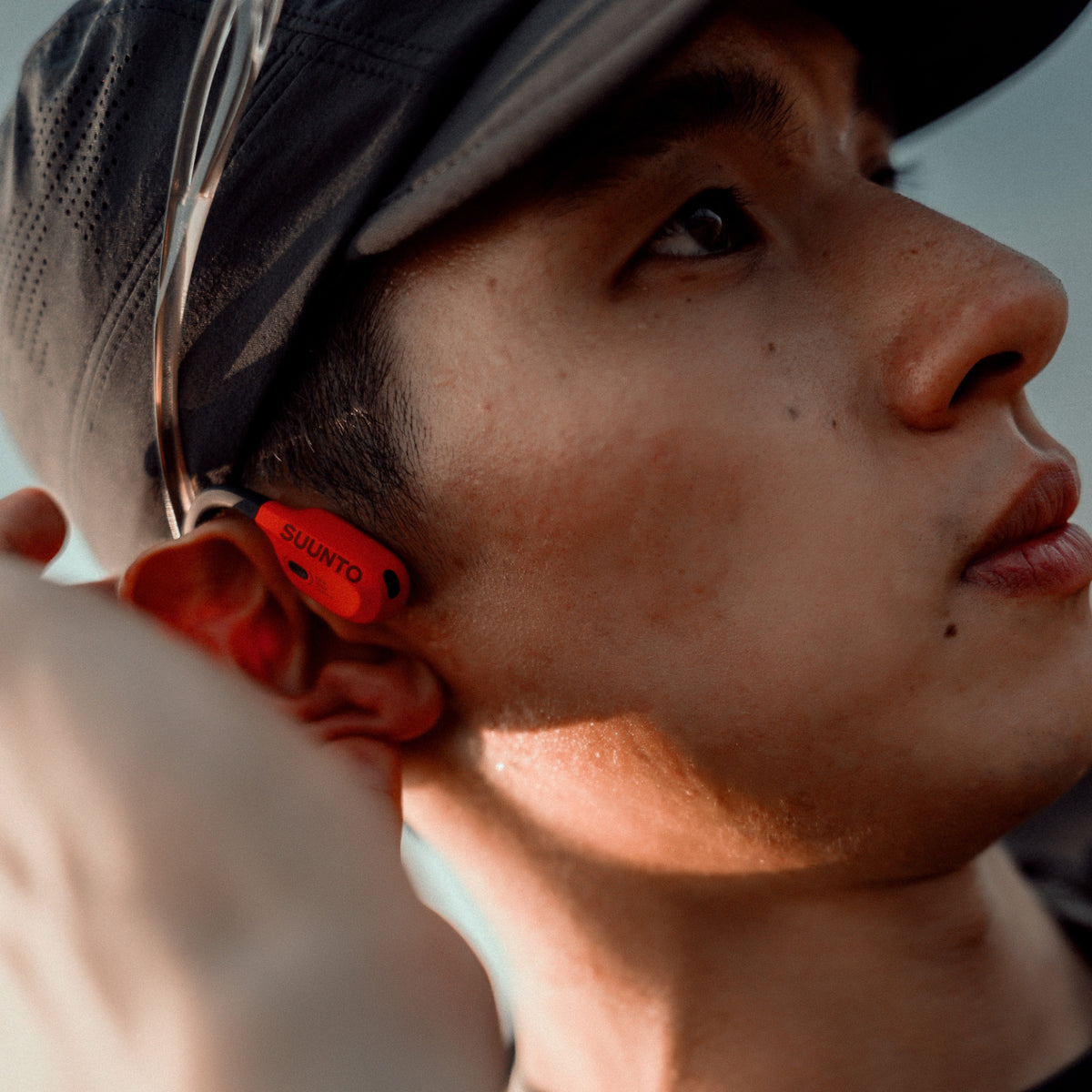 Suunto Wing water-resistant sports headphones designed for outdoor training and running