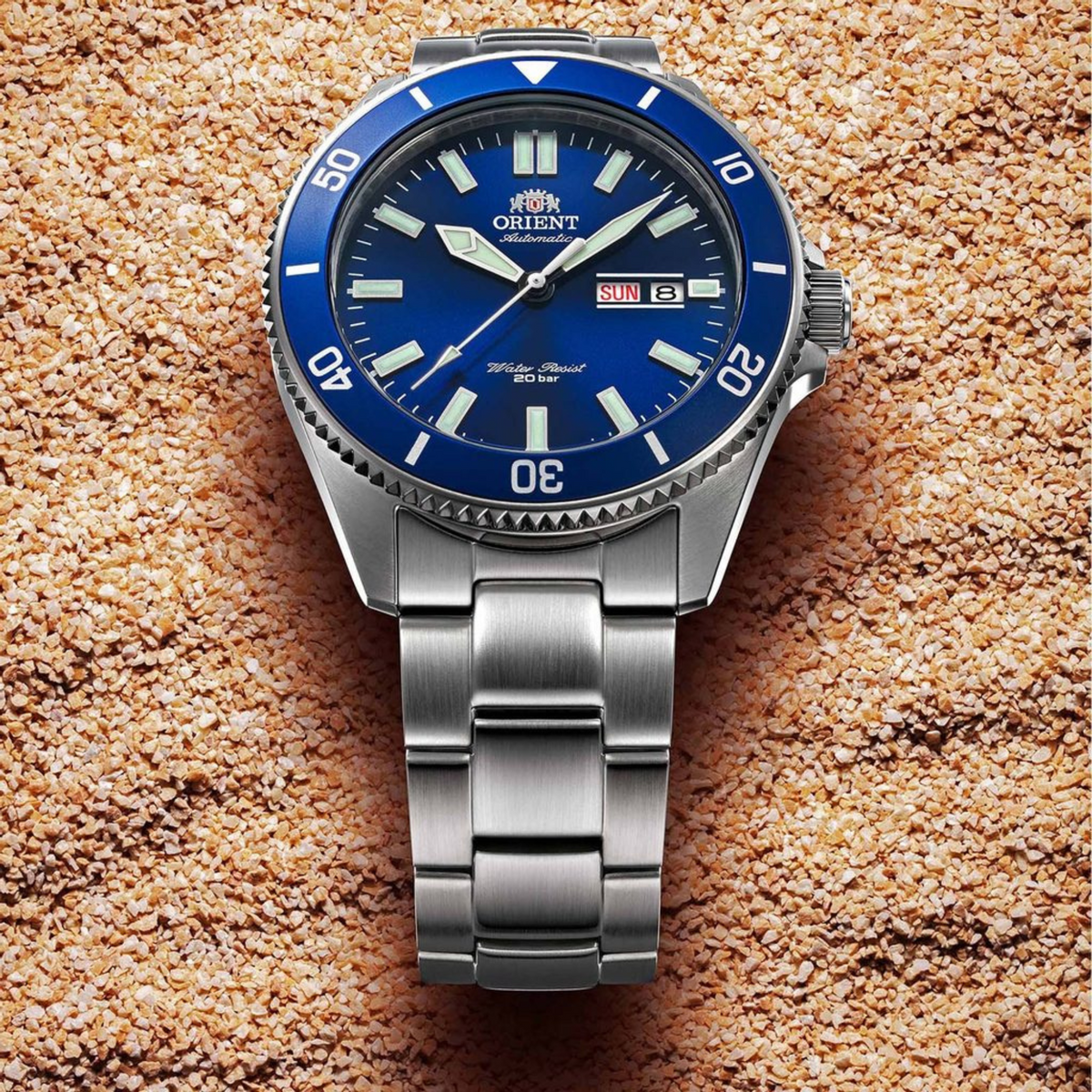 Automatic wristwatch with stainless steel bracelet, blue dial, date window, unidirectional bezel