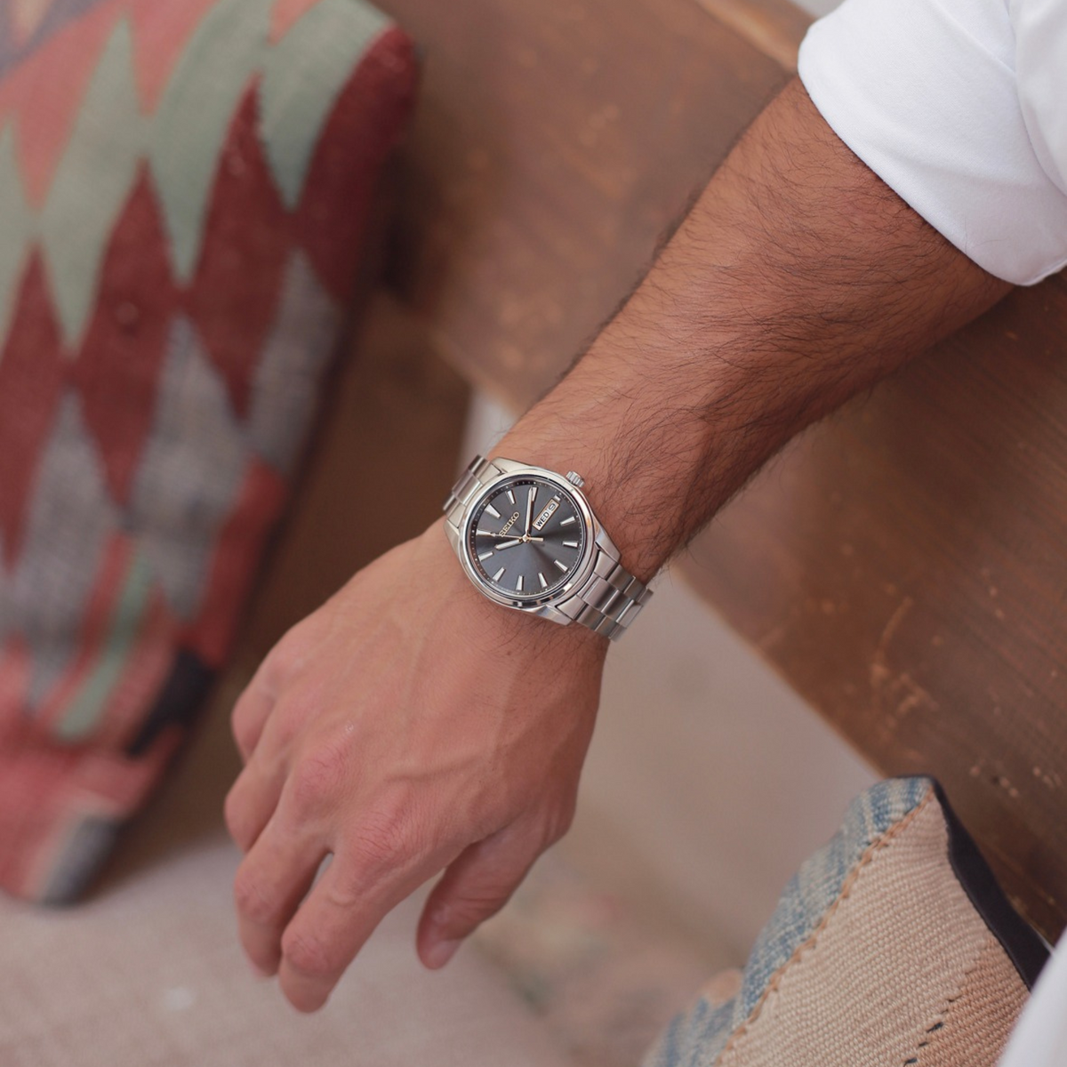Seiko SUR343P1 grey dial and stainless steel watch on wrist 