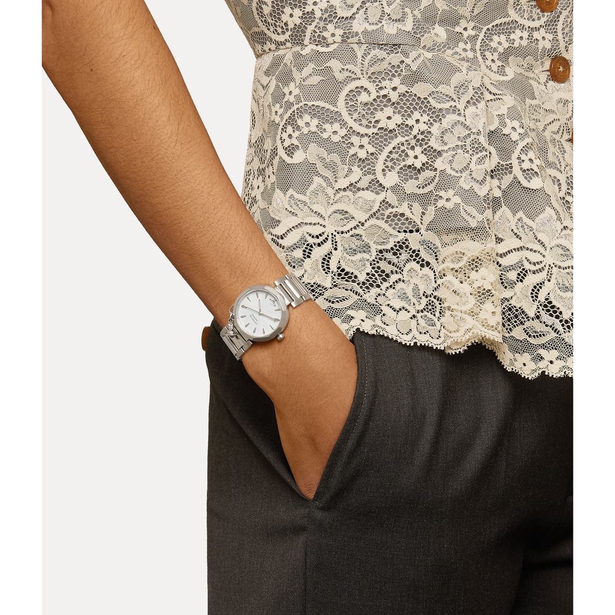 Vivienne Westwood Poplar quartz watch worn, blue dial and stainless steel bracelet on arm.