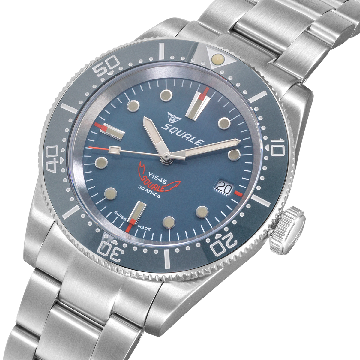 Men's steel wristwatch with blue dial, luminous markers, and rotating bezel