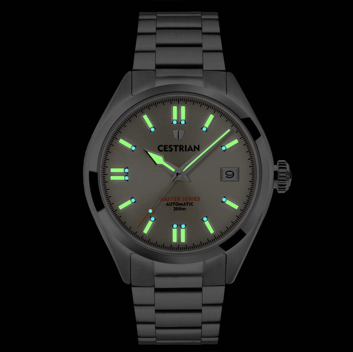 Men's steel automatic watch with dark dial and glowing green markers on metal bracelet.