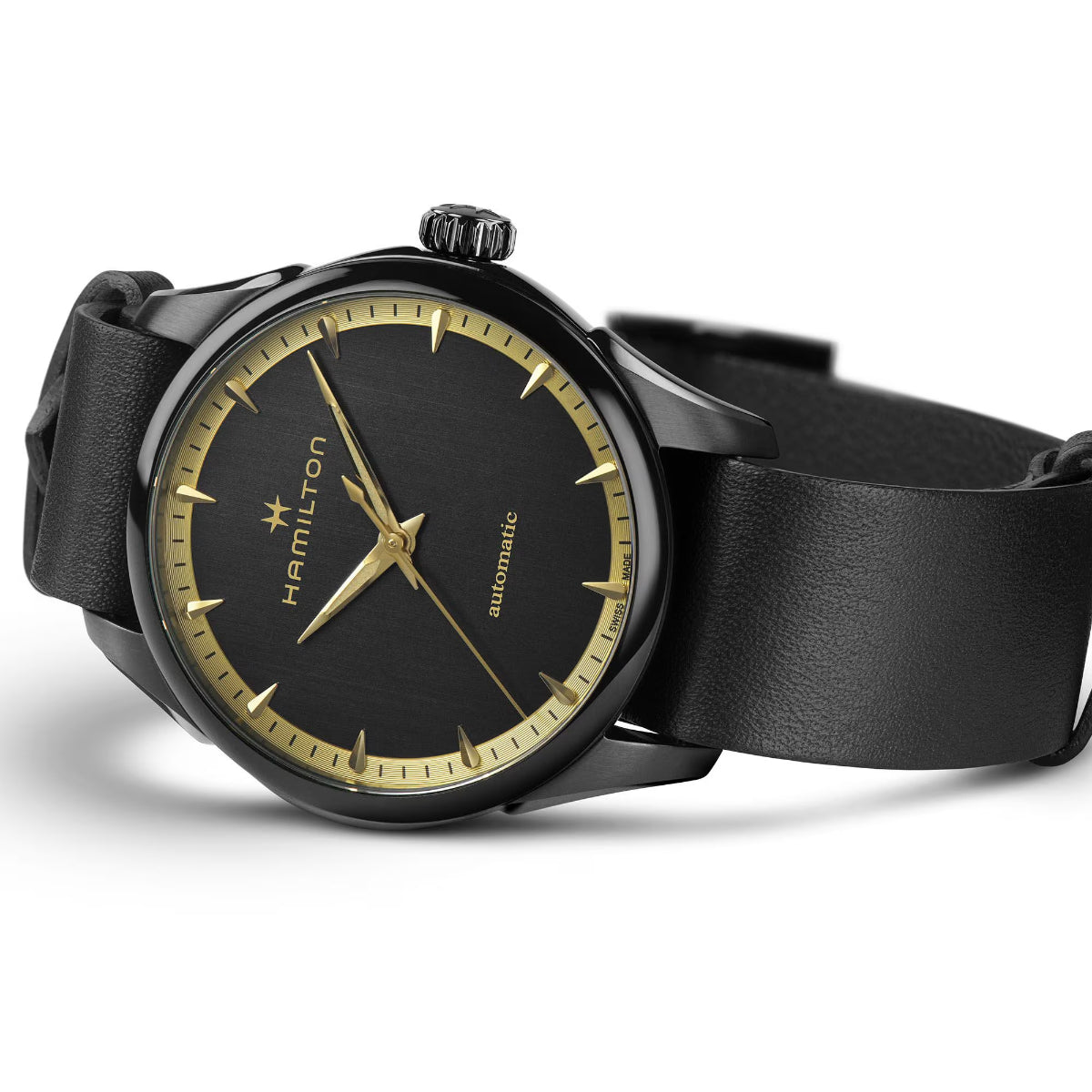 Black dial automatic watch with gold hands and markers, black leather strap