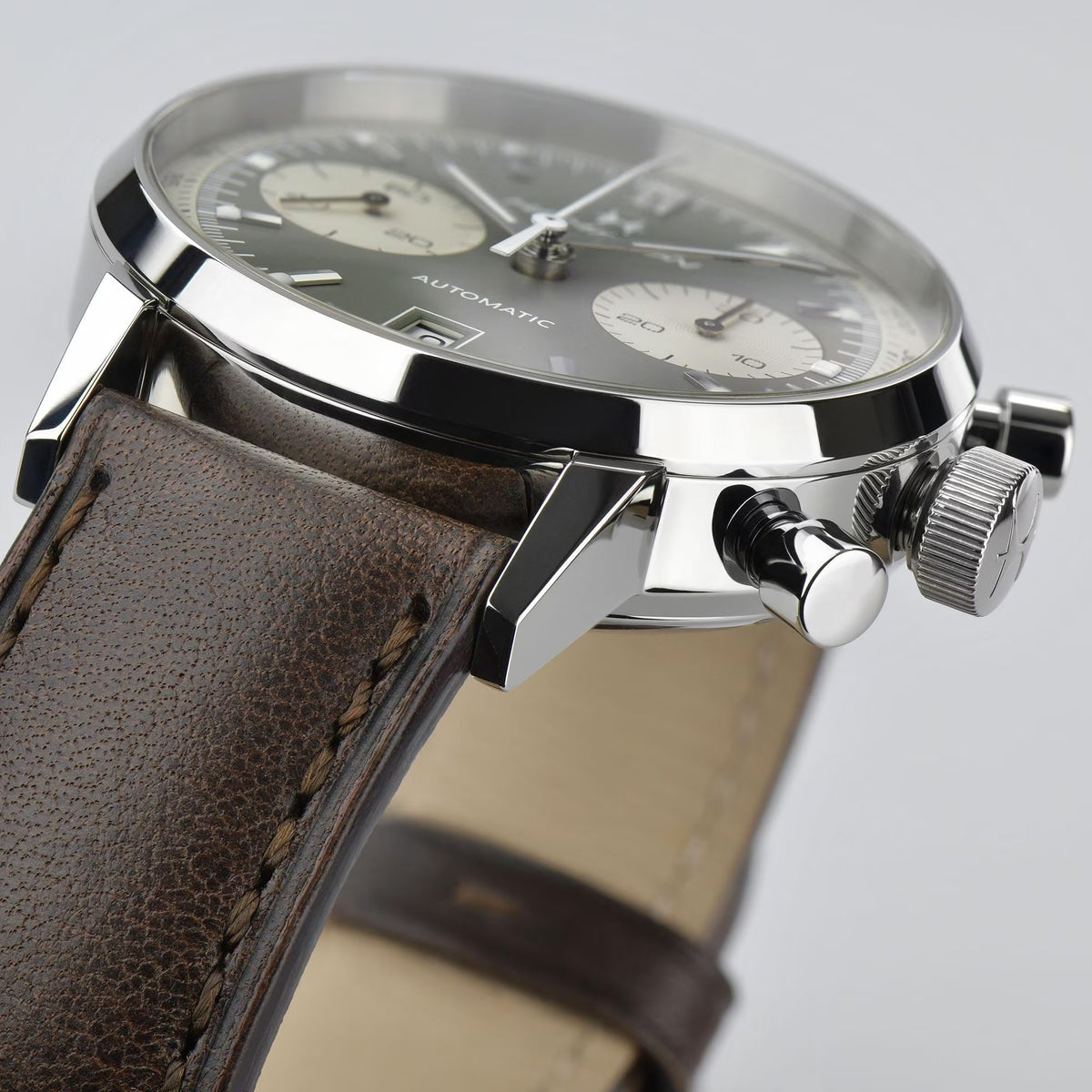 Hamilton automatic chronograph watch, silver bezel and brown leather strap, green dial