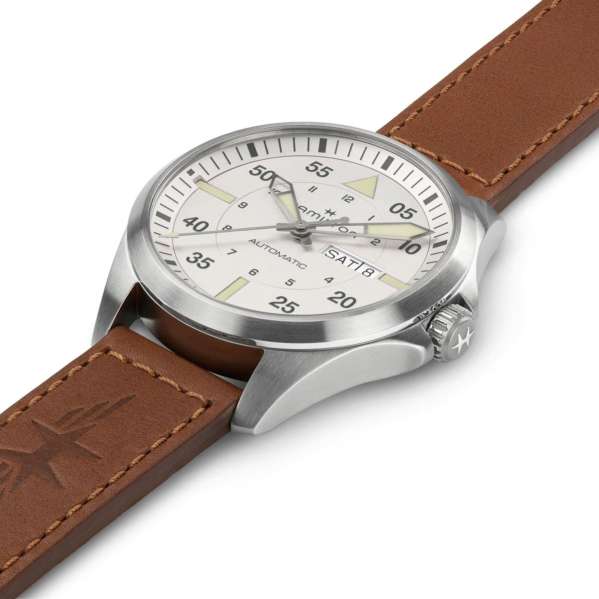 Hamilton H64635550 silver dial with day-date display and arabic numerals close-up 
