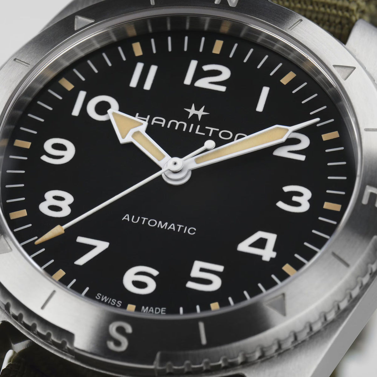 Hamilton H70225931 sand-blasted black dial with white Arabic numerals close-up