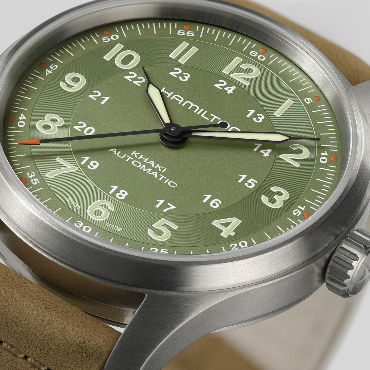 Hamilton H70545560 matte green dial with 24-hour inner scale and Arabic numerals close-up