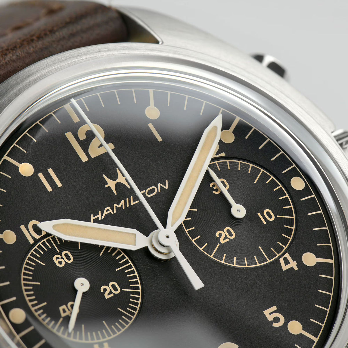 Hamilton H76409530 black dial with cream Arabic numerals and twin sub-dials close-up