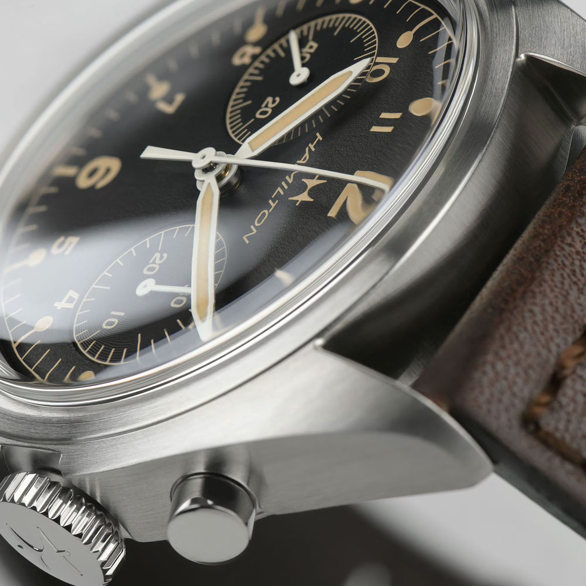 Hamilton Khaki Aviation H76409530 polished stainless steel case and crown detail  