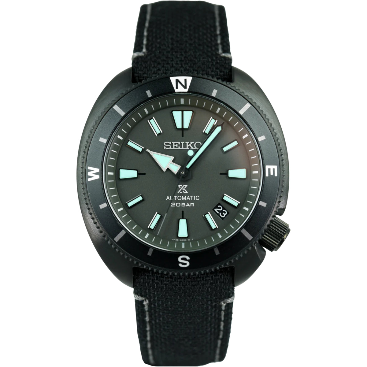 Seiko Prospex diver-style automatic watch with black fabric strap, green dial, date window at 3.