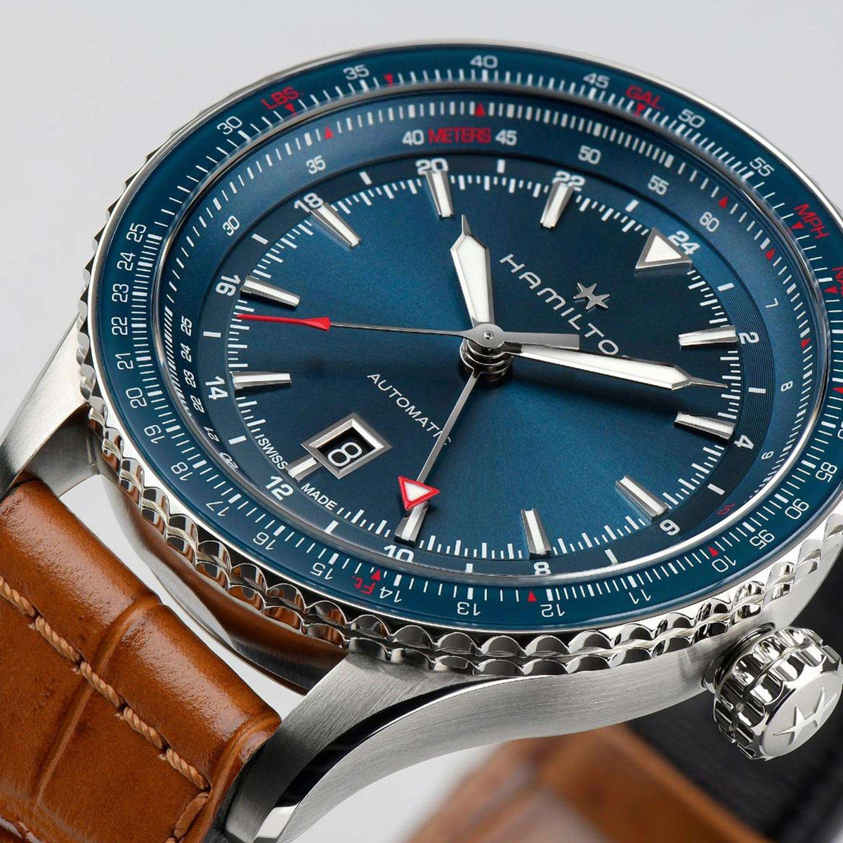 Mens automatic watch with blue dial, stainless case, leather strap, GMT bezel