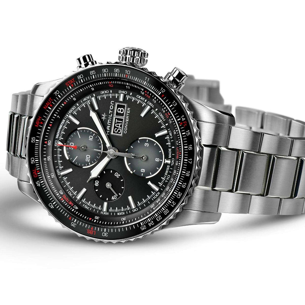 Men's stainless steel chronograph watch with black dial, red accents, and steel bracelet.