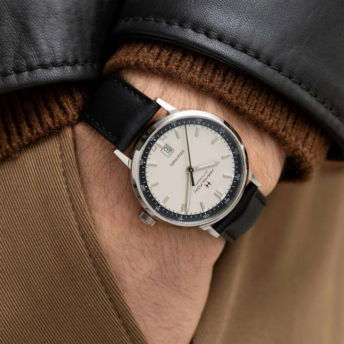 Men's Hamilton automatic watch on wrist, beige dial with black leather strap