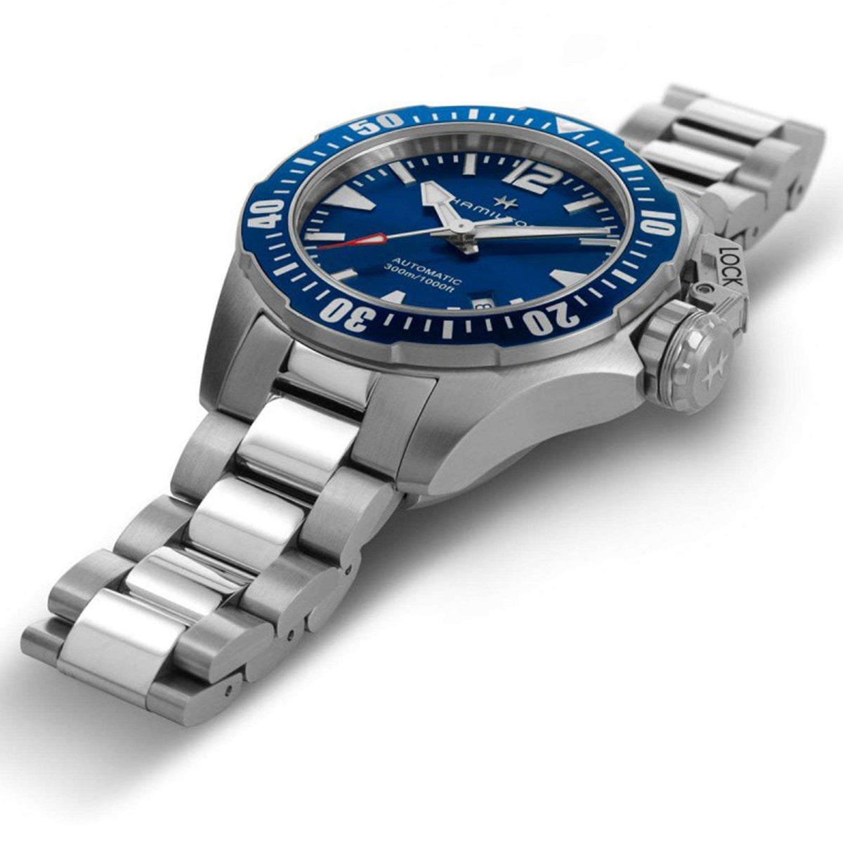 Men's stainless steel automatic watch with blue dial, rotating bezel and crown