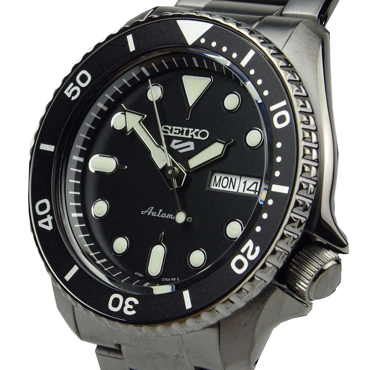 Men's black dial automatic watch with date window showing MON 12 and stainless bracelet